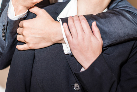 Office romance from behindの写真素材