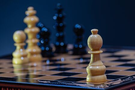 Chess pieces with dark backgroundの写真素材