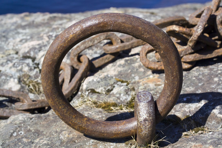 rusty metal mooring ringの写真素材