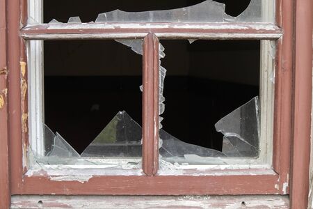 abandoned house with broken window