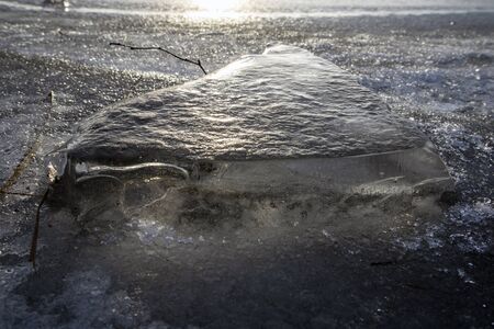 small block of ice in nature outdoors, finland