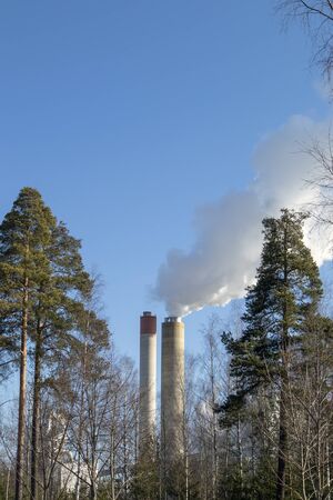 paper factory smokes in springtime, Finlandの写真素材