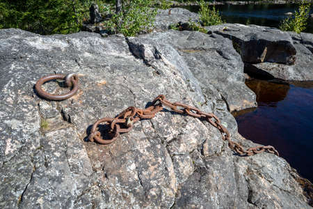 rusted chain and ring used for mooring or anchoringの写真素材