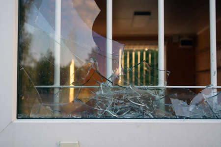 Broken window with bars
