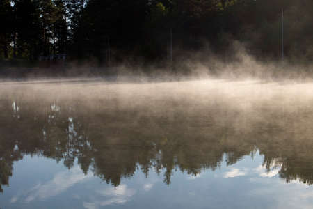 water vapor on the pond surfaceの写真素材