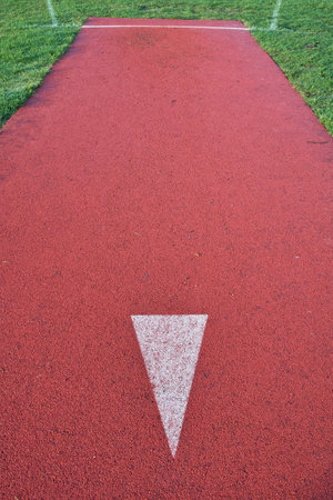 javelin throwing line marking on an athletics track outdoorsの写真素材