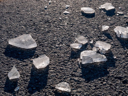 blocks of ice on the asphalt