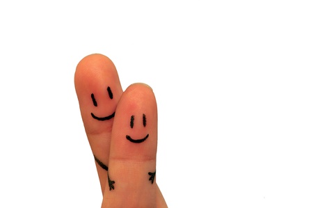 Painted finger smiley, happy theme, white backgroundの写真素材