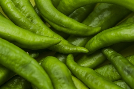 Green cayenne chili pepper, backgroundの写真素材