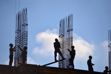 Silhouette of people working and building construction
の写真素材