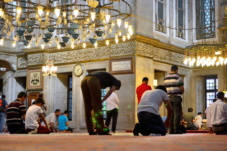 ISTANBUL, TURKEY - JULY 24: Eyup Sultan mosque muslims who pray, 24 July 2014 in Istanbul Turkey. Eyup mosque was built in 1458 and the mosque of Istanbul is the most visited.のeditorial素材
