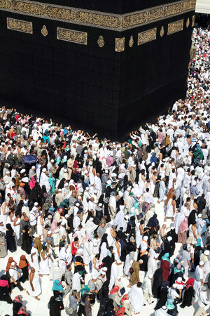MECCA, SAUDI ARABIA - FEBRUARY 2: Muslim pilgrims, from all around the World, revolving around the Kaaba on February 2, 2015 in Mecca, Saudi Arabia. Muslim people praying together at holy place.のeditorial素材