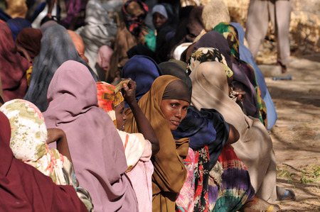 DADAAB, SOMALIA - AUGUST 7: Unidentified women live in the Dadaab refugee camp hundreds of thousands of Somalis wait for help because of hunger on August 7, 2011 in Dadaab, Somalia.のeditorial素材
