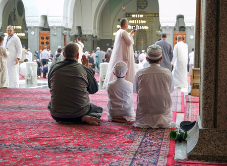 MEDINA, SAUDI ARABIA - JANUARY 31 : Muslims pray inside Masjid Quba January 31, 2015 in Medina, Saudi Arabia. This is the first mosque built by Prophet Muhammad pbuh in Islamのeditorial素材