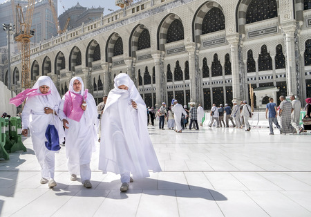 MECCA, SAUDI ARABIA - FEBRUARY 4: Muslim women walking on the road in the newly built Kaaba on...