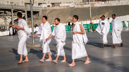 MECCA, SAUDI ARABIA - JAN 30: Muslim wearing ihram clothes and ready for Hajj on January 30, 2017 in Mecca, Saudi Arabia. Muslims all around the world face the Kaaba during prayer time.のeditorial素材