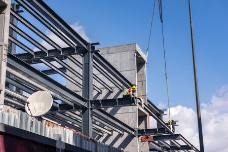 ISTANBUL, TURKEY - AUGUST 12, 2018:  The structural steel structure of a new commercial building against a clear blue sky in the background on August 12, 2018 in Istanbul, Turkey.のeditorial素材