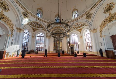 KONYA, TURKEY - FEBRUARY 10: An unidentified muslim man prays Aziziye Mosque on February 10, 2016 in Konya, Turkey. The mosque built by Sultan Abdulaziz's mother Hatun Pertevniyal was opened in 1874.のeditorial素材