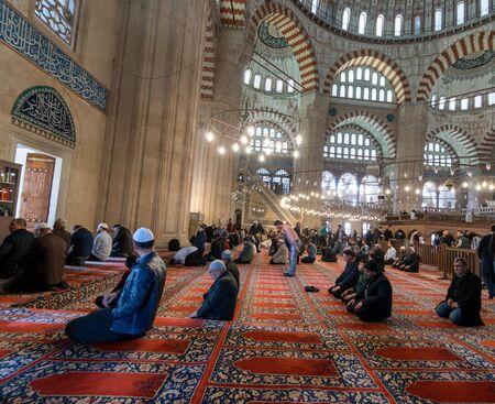 EDIRNE, TURKEY - MARCH 9: Muslim prayer in interior of Selimiye Mosque on March 9, 2019 in Edirne, Turkey. Selimiye Mosque built in 1575 by Architect Sinan with the request of Suleyman the Magnificentのeditorial素材