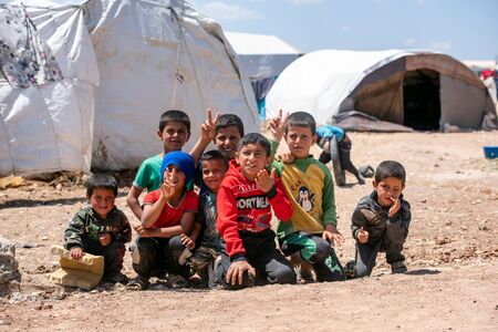 AZEZ, SYRIA â MAY 19: Kids, Refugee camp for syrian people in Azez on May 19, 2019 in Azez, Syria. In the civil war that began in Syria in 2011, 12 million people were displaced.のeditorial素材