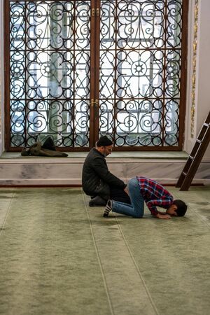 ISTANBUL, TURKEY - JANUARY 4: sheriff mosque muslim prayers in front of the window, 4 January 2020 in Istanbul Turkey. Mosque is a place where the cardigan of the prophet is hidden.のeditorial素材