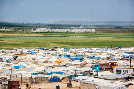 AZEZ, SYRIA â MAY 19: Refugee camp for syrian people on May 19, 2019 in Azez, Syria. In the civil war that began in Syria on 2011, 12 million people were displaced.のeditorial素材