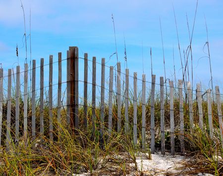 Weathered beach fence located in Gulf of Mexico Florida Beachの写真素材