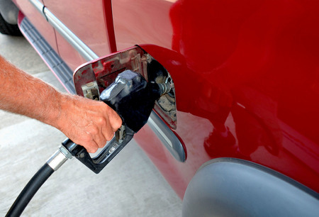 Man pumping gasolineの写真素材