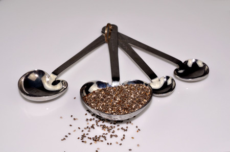 Chia seeds displayed in spoonの写真素材