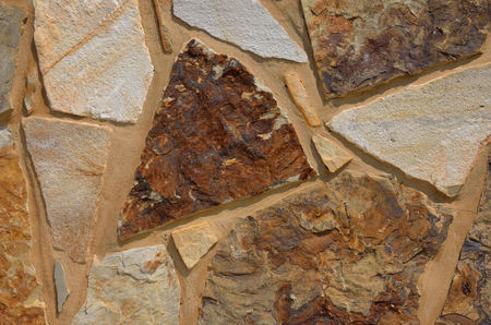 Textured rock wall, abstract stone background