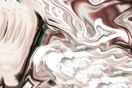 Beautiful abstraction of liquid paints in slow blending flow mixing together gentlyの写真素材