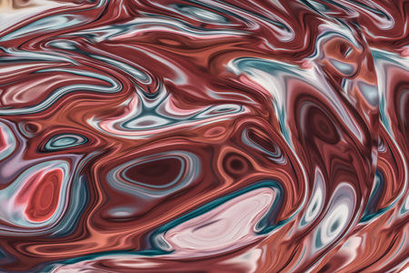 Beautiful abstraction of liquid paints in slow blending flow mixing together gentlyの写真素材