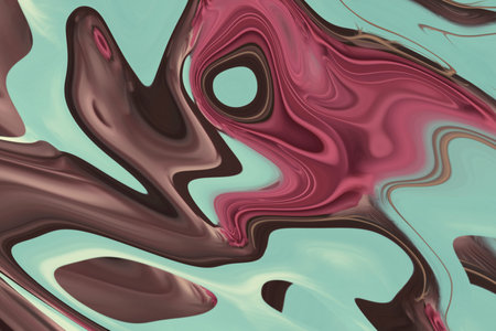 Beautiful abstraction of liquid paints in slow blending flow mixing together gentlyの写真素材