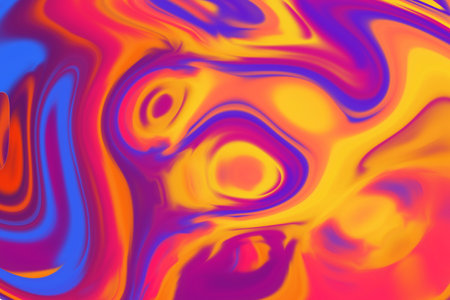 Beautiful abstraction of liquid paints in slow blending flow mixing together gentlyの写真素材