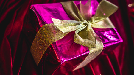 box of present with golden ribbonの写真素材