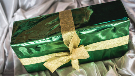 box of present with golden ribbonの写真素材