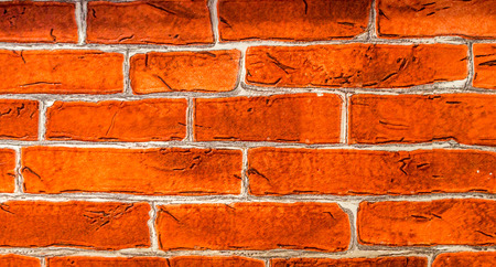 red brick wall background. lot of gradation and color. horizontal alignmentの写真素材