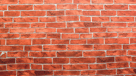 red brick wall background. lot of gradation and color. horizontal alignmentの写真素材