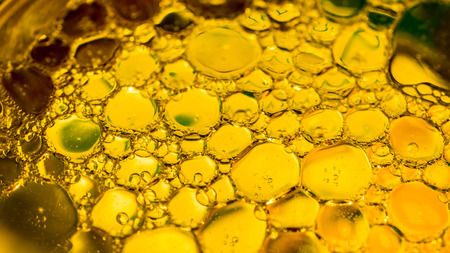 Dreamy colorful abstract background with water and oil.の写真素材