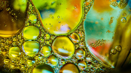 Dreamy colorful abstract background with water and oil.の写真素材