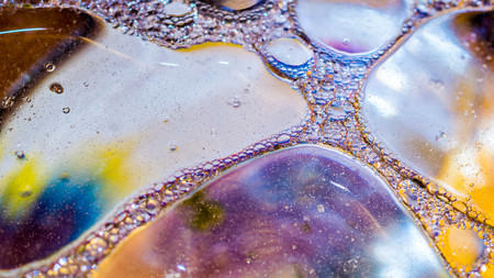 Dreamy colorful abstract background with water and oil.の写真素材