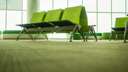 empty airport terminal waiting area with chairs. lounge in the airport with seatsの写真素材