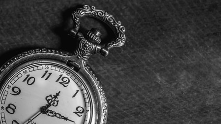 old antique pocket watch showing timeの写真素材