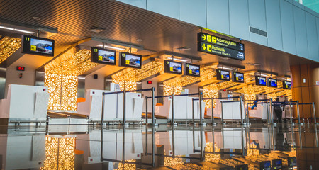 Pontianak, Kalimantan Barat / Indonesia - 5/10/2018 : check-in counter in the airport with beautiful lightingのeditorial素材