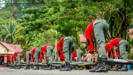 students of forestry vocational school of Samarinda performing military attraction on their inauguration dayのeditorial素材