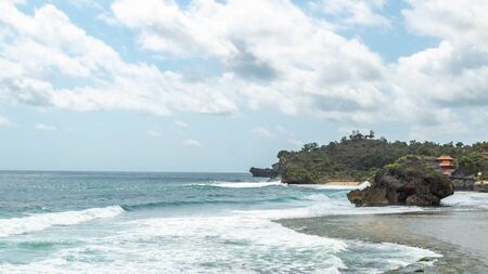 beautiful view of rocky beach, Kukup, Gunung Kidul, yogyakarta, Indonesiaの写真素材