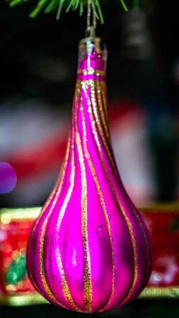 detail closeup of Christmas ornament hanging on the treeの写真素材