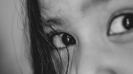 Asian young girl's eye. Black and whiteの写真素材