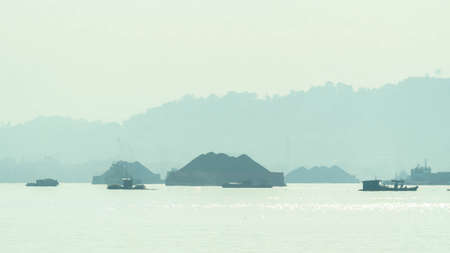 Commercial boat cruising Mahakam river, Samarinda in the morning. Traffic at Mahakam river.の写真素材