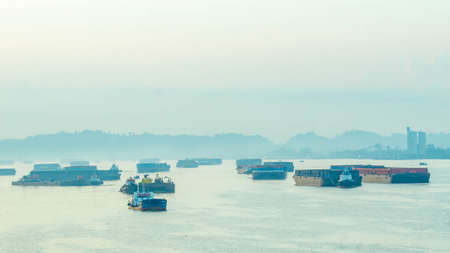Commercial boat cruising Mahakam river, Samarinda in the morning. Traffic at Mahakam river.の写真素材